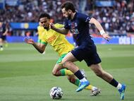 PARIS (France), 22/04/2026.- Khvicha Kvaratskhelia (R) of PSG and Mathieu Acapandie of Nantes in action during the French Ligue 1 soccer match between PSG and FC Nantes, in Paris, France, 22 April 2026. (Francia) EFE/EPA/CHRISTOPHE PETIT TESSON sorry for repeat sending the pic
there is a problem in my photomicnic