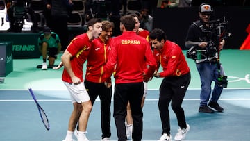 Tennis - Davis Cup - Final 8 - Semi Final - Spain v Germany - SuperTennis Arena, Bologna, Italy - November 22, 2025 Spain's Pedro Martinez and Marcel Granollers celebrate winning the Semi Final with Pablo Carreno Busta, Jaume Munar and captain David Ferrer after their doubles match against Germany's Tim Puetz and Kevin Krawietz REUTERS/Alessandro Garofalo