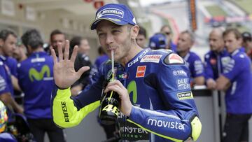 Valentino Rossi, of Italy, waves after he qualified in the third spot for the Grand Prix of the Americas MotoGP motorcycle race, Saturday, April 22, 2017, in Austin, Texas. (AP Photo/Eric Gay)