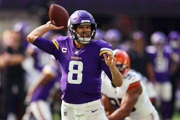 Kirk Cousins #8 of the Minnesota Vikings throws a pass during the first quarter in the game against the Cleveland Browns at U.S. Bank Stadium on October 03, 2021 in Minneapolis, Minnesota.