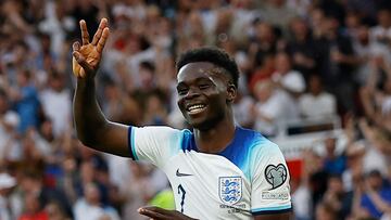 Soccer Football - UEFA Euro 2024 Qualifier - Group C - England v North Macedonia - Old Trafford, Manchester, Britain - June 19, 2023 England's Bukayo Saka celebrates scoring their fifth goal and his hat-trick Action Images via Reuters/Jason Cairnduff