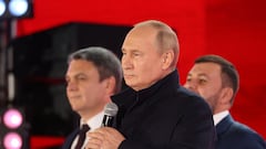 Russian President Vladimir Putin and Denis Pushilin and Leonid Pasechnik, who are the Russian-installed leaders in Ukraine's Donetsk and Luhansk regions, attend a concert marking the declared annexation of the Russian-controlled territories of four Ukraine's Donetsk, Luhansk, Kherson and Zaporizhzhia regions, after holding what Russian authorities called referendums in the occupied areas of Ukraine that were condemned by Kyiv and governments worldwide, in Red Square in central Moscow, Russia, September 30, 2022. Sputnik/Sergei Karpukhin/Pool via REUTERS ATTENTION EDITORS - THIS IMAGE WAS PROVIDED BY A THIRD PARTY.