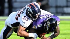 BALTIMORE, MARYLAND - DECEMBER 04: Jonathon Cooper #53 of the Denver Broncos sacks Lamar Jackson #8 of the Baltimore Ravens in the first half at M&T Bank Stadium on December 04, 2022 in Baltimore, Maryland.   Greg Fiume/Getty Images/AFP (Photo by Greg Fiume / GETTY IMAGES NORTH AMERICA / Getty Images via AFP)