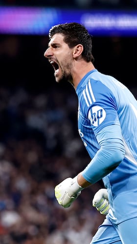 The Belgian stopper barely misses a shot as he takes on a lightning-fast pingpong ball machine in training.
