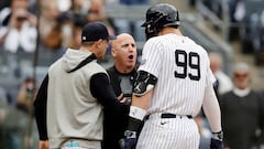 NEW YORK, NEW YORK - MAY 04: Aaron Judge #99 and manager Aaron Boone #17 of the New York Yankees argue with home plate umpire Ryan Blakney after Judge was ejected during the seventh inning against the Detroit Tigers at Yankee Stadium on May 04, 2024 in New York City.   Jim McIsaac/Getty Images/AFP (Photo by Jim McIsaac / GETTY IMAGES NORTH AMERICA / Getty Images via AFP)
