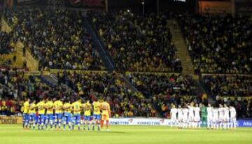 Real Madrid & UD Las Palmas players observe a minute's silence pre match.