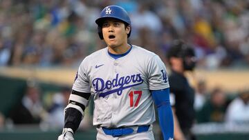 OAKLAND, CALIFORNIA - AUGUST 03: Shohei Ohtani #17 of the Los Angeles Dodgers reacts walking back to the dugout after he was called out on strikes against the Oakland Athletics in the top of the seventh inning at the Oakland Coliseum on August 3, 2024 in Oakland, California. Thearon W. Henderson/Getty Images/AFP (Photo by Thearon W. Henderson / GETTY IMAGES NORTH AMERICA / Getty Images via AFP)