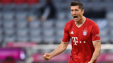 Bayern Munich&#039;s Polish forward Robert Lewandowski celebrates scoring the opening goal during the German first division Bundesliga football match FC Bayern Munich vs Hertha Berlin on October 4, 2020 in Munich, southern Germany. (Photo by CHRISTOF STAC