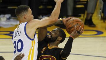 June 13, 2016; Oakland, CA, USA; Cleveland Cavaliers guard Kyrie Irving (2) moves to the basket against Golden State Warriors guard Stephen Curry (30) during the second half in game five of the NBA Finals at Oracle Arena. Mandatory Credit: Cary Edmondson-USA TODAY Sports