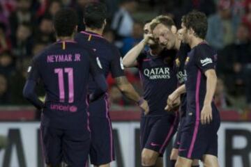 Ivan Rakitic gets a pat on the head.