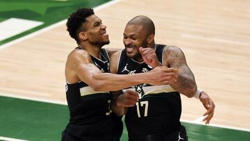 MILWAUKEE, WISCONSIN - JULY 20: Giannis Antetokounmpo #34 of the Milwaukee Bucks celebrates with teammate P.J. Tucker #17 in the final seconds before defeating the Phoenix Suns in Game Six to win the 2021 NBA Finals at Fiserv Forum on July 20, 2021 in Milwaukee, Wisconsin. NOTE TO USER: User expressly acknowledges and agrees that, by downloading and or using this photograph, User is consenting to the terms and conditions of the Getty Images License Agreement.   Jonathan Daniel/Getty Images/AFP
 == FOR NEWSPAPERS, INTERNET, TELCOS &amp; TELEVISION USE ONLY ==