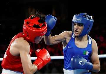 Imane Khelif of Algeria in action against Janjaem Suwannapheng of Thailand.