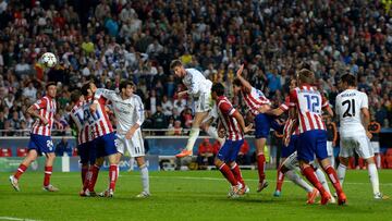 LISBON, PORTUGAL - MAY 24:  Sergio Ramos of Real Madrid heads in their first goal during the UEFA Champions League Final between Real Madrid and Atletico de Madrid at Estadio da Luz on May 24, 2014 in Lisbon, Portugal.  (Photo by Michael Regan/Getty Image