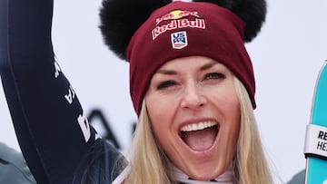 Alpine Skiing - FIS Alpine Ski World Cup - Women's Super G - Val d'Isere, France - December 21, 2025 Lindsey Vonn of the U.S. celebrates on the podium after placing third in the women's Super G REUTERS/Christian Hartmann