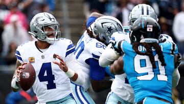 CHARLOTTE, NORTH CAROLINA - OCTOBER 12: Dak Prescott #4 of the Dallas Cowboys looks to pass during the first quarter against the Carolina Panthers in the game at Bank of America Stadium on October 12, 2025 in Charlotte, North Carolina. Jared C. Tilton/Getty Images/AFP (Photo by Jared C. Tilton / GETTY IMAGES NORTH AMERICA / Getty Images via AFP)