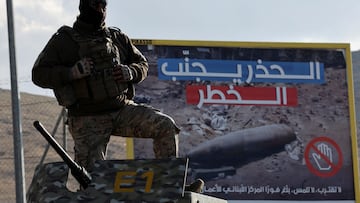 A member of the Lebanese army stands on top of a military vehicle at Masnaa Border Crossing, after Syrian rebels announced that they have ousted President Bashar al-Assad, Lebanon, December 8, 2024. REUTERS/Amr Abdallah Dalsh