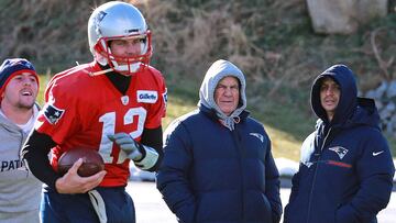 (12/20/2017- Foxboro, MA) New England Patriots head coach Bill Belichick chats with head strength and conditioning coach Moses Cabrera as he keeps an eye on quarterback Tom Brady during practice at Gillette Stadium on Wednesday, December 20, 2017. Staff