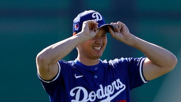 GLENDALE, ARIZONA - FEBRUARY 14: Shohei Ohtani #17 of the Los Angeles Dodgers laughs during workouts at Camelback Ranch on February 14, 2024 in Glendale, Arizona.   Chris Coduto/Getty Images/AFP (Photo by Chris Coduto / GETTY IMAGES NORTH AMERICA / Getty Images via AFP)