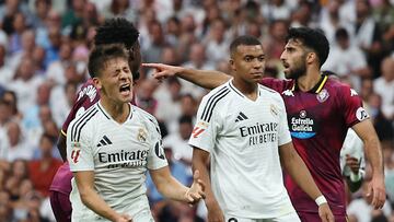 Soccer Football - LaLiga - Real Madrid v Real Valladolid - Santiago Bernabeu, Madrid, Spain - August 25, 2024 Real Madrid's Arda Guler and Kylian Mbappe react REUTERS/Violeta Santos Moura