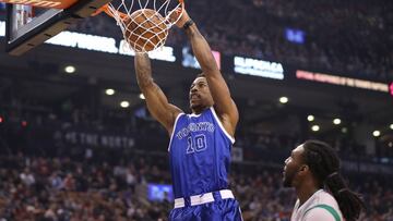 Jan 10, 2017; Toronto, Ontario, CAN; Toronto Raptors guard DeMar DeRozan (10) dunks the ball against the Boston Celtics during the first half at Air Canada Centre. Mandatory Credit: Tom Szczerbowski-USA TODAY Sports