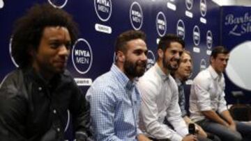 Los jugadores del Real Madrid, el brasileño Marcelo Vieira; Daniel Carvajal, Francisco Román Alarcón "Isco", el croata Luka Modric, y el galés Gareth Bale, de izda a dcha, durante un acto promocional.