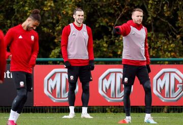 Soccer Football - Euro 2020 Qualifier - Wales Training - The Vale Resort, Hensol, Britain - October 12, 2019 Wales' Gareth Bale and Chris Gunter during training