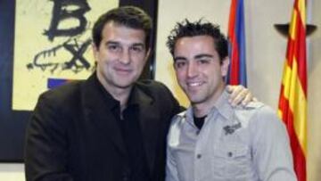 <b>RENOVADO.</b> El centrocampista del Barcelona Xavi Hernández ha firmado su ampliación de contrato, por lo que permanecerá en la entidad blaugrana hasta junio de 2014 con una claúsula de rescisión de 80 millones de euros.