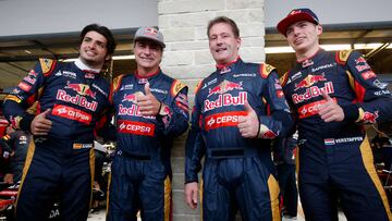 AUSTIN, TX - OCTOBER 24:  Max Verstappen of Netherlands and Scuderia Toro Rosso and Carlos Sainz of Spain and Scuderia Toro Rosso pose with their fathers, Jos Verstappen and Carlos Sainz, outside the garage after qualifying was suspended due to bad weather for the United States Formula One Grand Prix at Circuit of The Americas on October 24, 2015 in Austin, United States.  (Photo by Andrew Hone/Getty Images) // Getty Images / Red Bull Content Pool // SI201510240264 // Usage for editorial use only // 