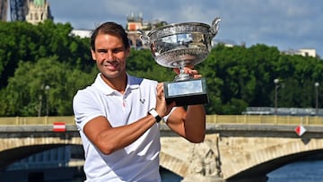 Rafa Nadal poses with the trophy after his 14th French Open triumph.