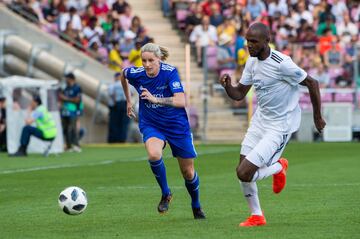 Kelly Smith y Eric Abidal.