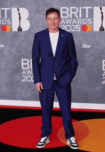 Jason Isaacs posa en la alfombra de los Brit Awards 2025.