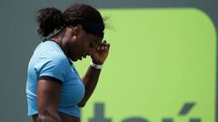 Serena Williams reacts after missing a shot against Svetlana Kuznetsova.