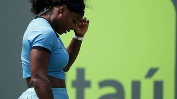 Serena Williams reacts after missing a shot against Svetlana Kuznetsova.