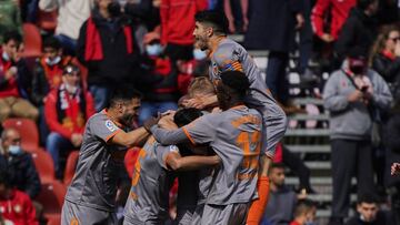 MALLORCA, SPAIN - FEBRUARY 26: Gabriel Paulista of Valencia CF celebrates scoring his team's first goal with teammates during the LaLiga Santander match between RCD Mallorca and Valencia CF at Estadio de Son Moix on February 26, 2022 in Mallorca, Spa