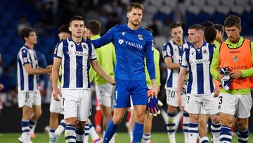 Real Sociedad's Spanish forward #07 Ander Barrenetxea, Real Sociedad's Spanish goalkeeper #01 Alex Remiro and teammates react to their defeat at the end of the Spanish league football match between Real Sociedad and Rayo Vallecano de Madrid at the Anoeta stadium in San Sebastian, on August 18, 2024. (Photo by ANDER GILLENEA / AFP)