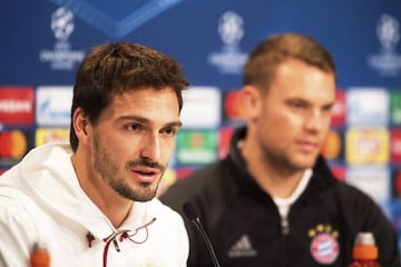 Neuer (right) and Mats Hummels speak to the media ahead of Bayern Munich's clash with Arsenal.