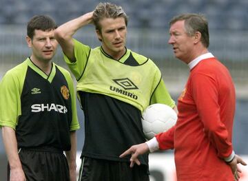 Ferguson durante un entrenamiento con David Beckham en 1999.