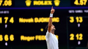 14 July 2019, England, London: Serbian tennis player Novak Djokovic celebrates defeating Switzerland&#039;s Roger Federer after their men&#039;s singles final match on day thirteen of the 2019 Wimbledon Grand Slam tennis tournament at the All England Lawn Tennis and Croquet Club. Photo: Victoria Jones/PA Wire/dpa