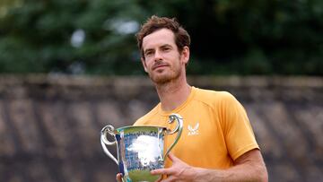 Britain's Andy Murray celebrates with the trophy after winning the final match against Austria's Jurij Rodionov