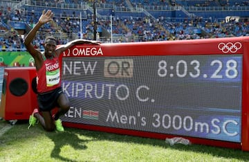 Kipruto poses after winning the Men's 3000m Steeplechase Final with a new Olympic record of 8:03.28.