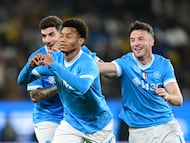 Soccer Football - Supercoppa Italiana - Final - Napoli v Bologna - Al Awwal Park, Riyadh, Saudi Arabia - December 22, 2025 Napoli's David Neres celebrates scoring their first goal with Amir Rrahmani and Giovanni Di Lorenzo REUTERS/Daniele Mascolo