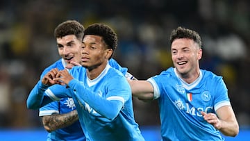 Soccer Football - Supercoppa Italiana - Final - Napoli v Bologna - Al Awwal Park, Riyadh, Saudi Arabia - December 22, 2025 Napoli's David Neres celebrates scoring their first goal with Amir Rrahmani and Giovanni Di Lorenzo REUTERS/Daniele Mascolo
