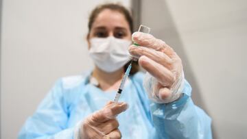 A medical worker fills a syringe with a dose of AstraZeneca's coronavirus disease (COVID-19) vaccine at the Belexpo vaccination centre, as Serbia started to immunise business people across the region, in Belgrade, Serbia, March 27, 2021. REUTERS/Zorana Jevtic