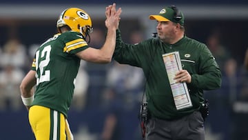 Jan 15, 2017; Arlington, TX, USA; Green Bay Packers quarterback Aaron Rodgers (12) celebrates a touchdown with head coach Mike McCarthy against the Dallas Cowboys in the NFC Divisional playoff game at AT&T Stadium. Mandatory Credit: Matthew Emmons-US