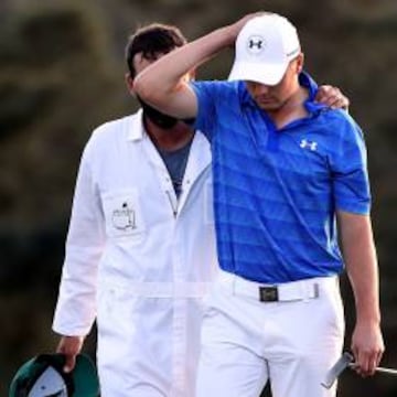 Michael Greller consuela a Jordan Spieth.