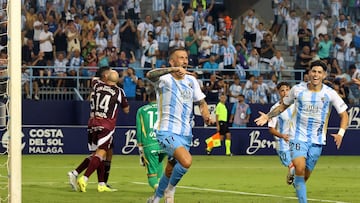 Dioni y Antoñito festejan el gol del primero al Albacete.