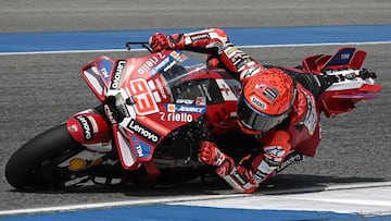Ducati Lenovo Team's Spanish rider Marc Marquez rides on the track during the second day of the 2026 MotoGP pre-season test at the Buriram International Circuit in Buriram on February 22, 2026. (Photo by Lillian SUWANRUMPHA / AFP)
