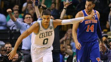 BOSTON, MA - OCTOBER 24: Jayson Tatum #0 of the Boston Celtics reacts in front of Willy Hernangomez #14 of the New York Knicks after hitting a three point shot during the fourth quarter at TD Garden on October 24, 2017 in Boston, Massachusetts. The Celtics defeat the Knicks 110-89. Maddie Meyer/Getty Images/AFP
== FOR NEWSPAPERS, INTERNET, TELCOS & TELEVISION USE ONLY ==