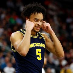 Who are the most famous NBA players from Michigan University?