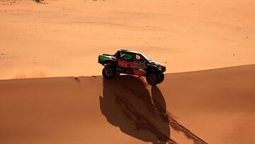 Saudi driver Yazeed Al Rajhi and German co-driver Timo Gottschalk compete during Stage 8 of the Dakar Rally 2025, between Al Duwadimi and Riyadh, Saudi Arabia, on January 13, 2025. (Photo by Valery HACHE / AFP)